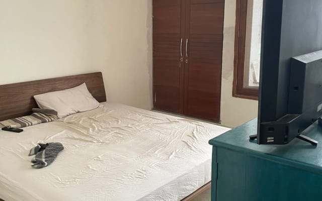 Quarto partilhado num apartamento acolhedor em Nova Deli