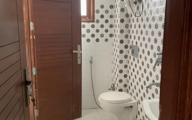 Quarto partilhado num apartamento acolhedor em Nova Deli