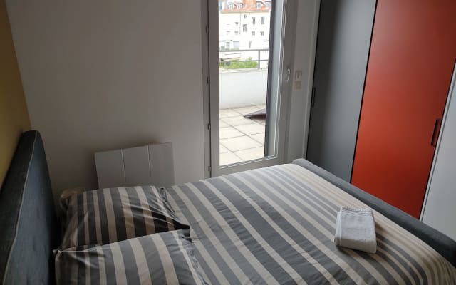 Room in rooftop apartment