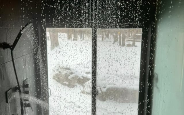 Farrel's listing on misterb&b - Rain shower head inside the large steam shower