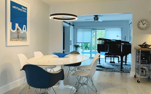 Large, sunny room + clothing optional heated pool + near gay district!