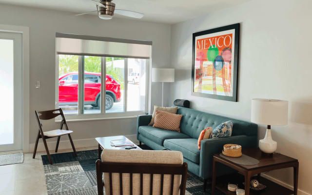 Large, sunny room + clothing optional heated pool + near gay district!