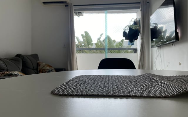 A single gay man's apartment, simple and very welcoming.