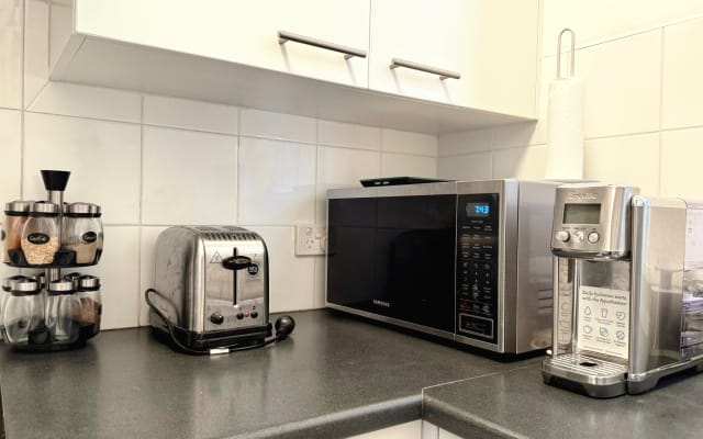 Sunil's listing on misterb&b - Fully equipped kitchen with modern appliances and all the basic essentials available
