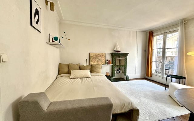 Apartment with sofa bed, balcony and view of the Eiffel Tower