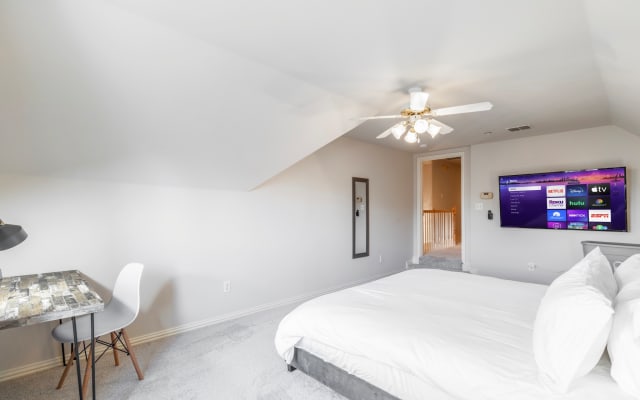 John's listing on misterb&b - 4th upstairs bedroom, king size bed, smart TV.  There's also a 5th bedroom upstairs with Queen bed and smart TV