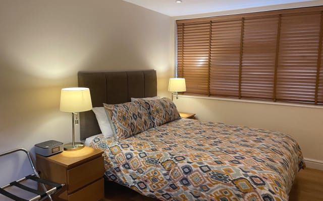 Detached large ensuite guest suite including kitchenette and parking.