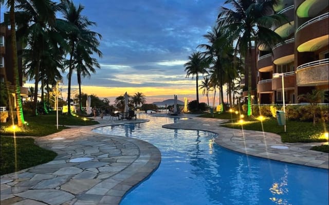 This is a penthouse two floors with two suite bedrooms. On the beach .