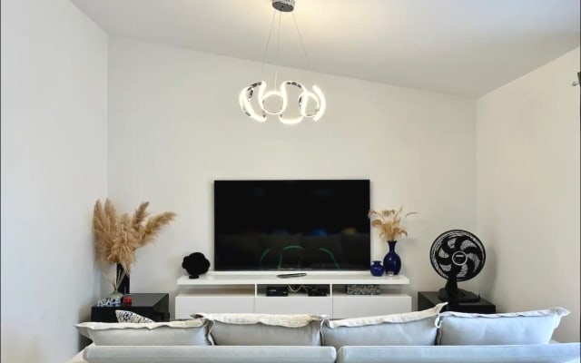 This is a penthouse two floors with two suite bedrooms. On the beach .