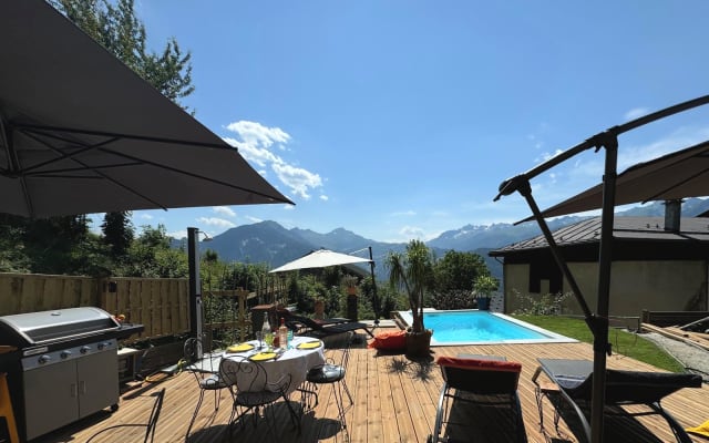 Chambre LA MEULE avec vue sur les montagnes