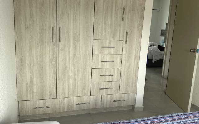 Room in shared house near AIFA Ojo de Agua and commercial centers.
