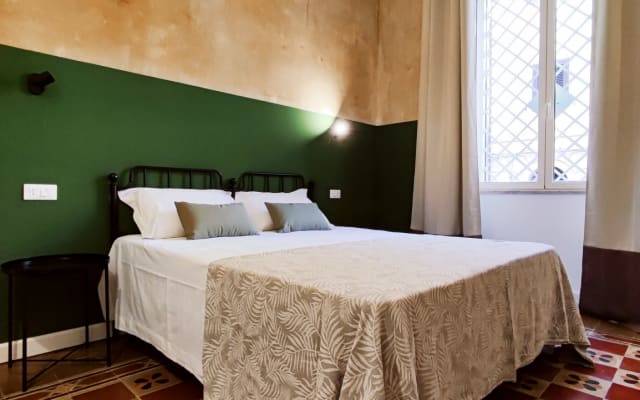 Donna Oliva Guest House, elegant rooms with private bathrooms in town.