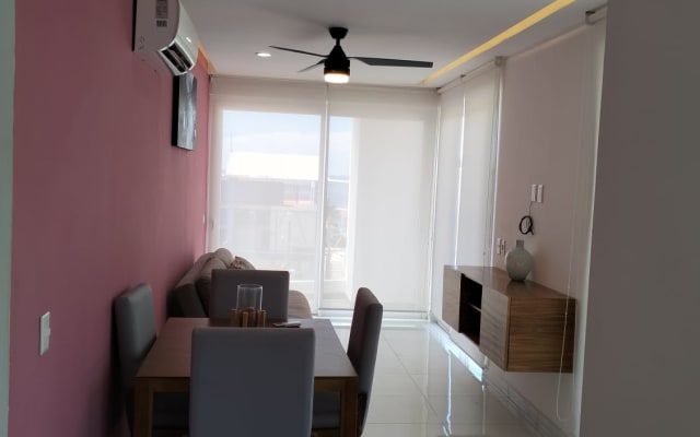 Casa de dois quartos junto à praia com um sofá-cama, 2 casas de banho...