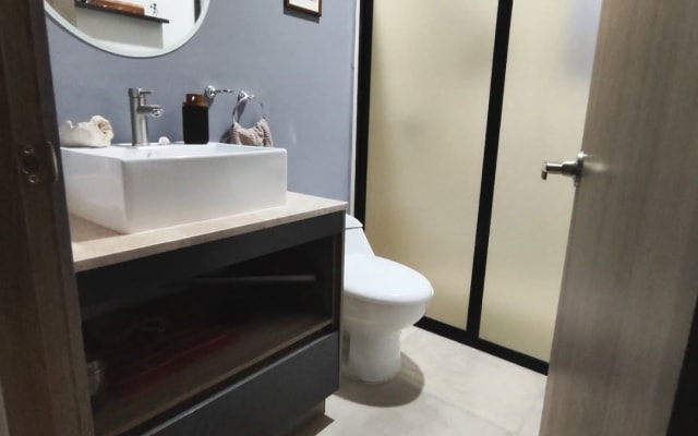 Habitación compartida en cómodo departamento