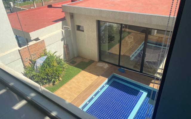 Camera con bagno condiviso in duplex