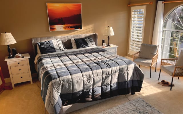 Paul's listing on misterb&b - This is primary bedroom of the house, with a large balcony overlooking the front yard. It is available only when the full house is rented.