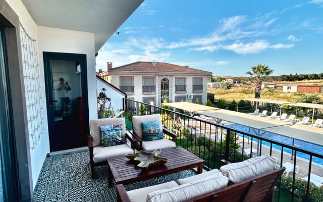 Apartamento acolhedor num bairro tranquilo com piscina