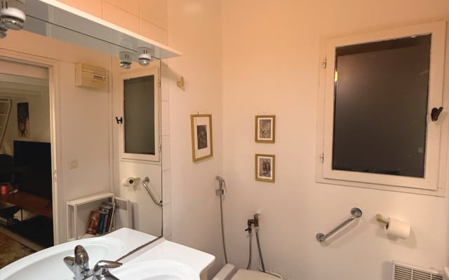 Acogedor estudio con piscina y jardín