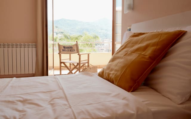 Sam's listing on misterb&b - Bedroom 2 (a nice balcony with stunning views out to sea)