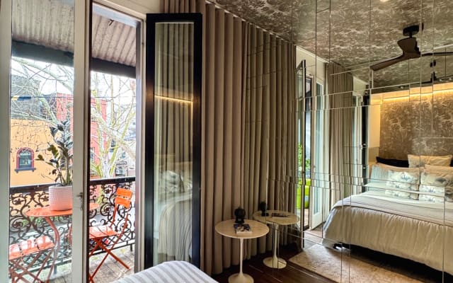 Chic Designer Bedroom with Balcony in Iconic Paddington Terrace