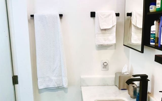Stephen's listing on misterb&b - Sink and in-wall medicine cabinet in full bathroom.