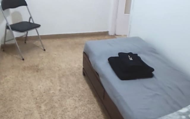 Quarto individual em zona central