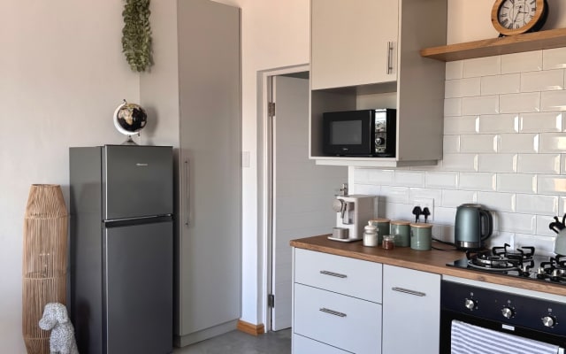 A unique and stylish apartment in a farm setting right in town