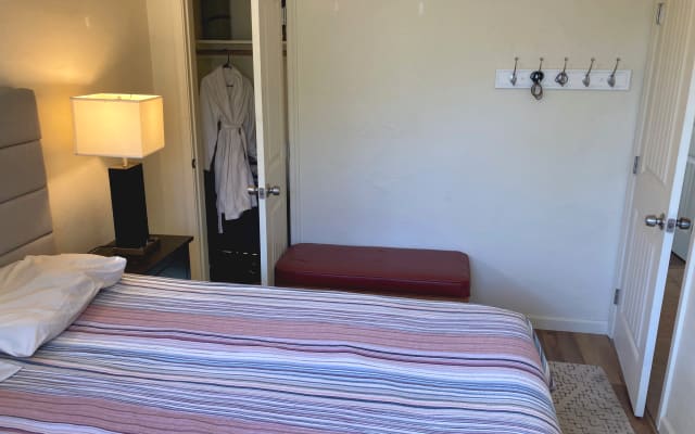Queen bed with secret garden in urban desert