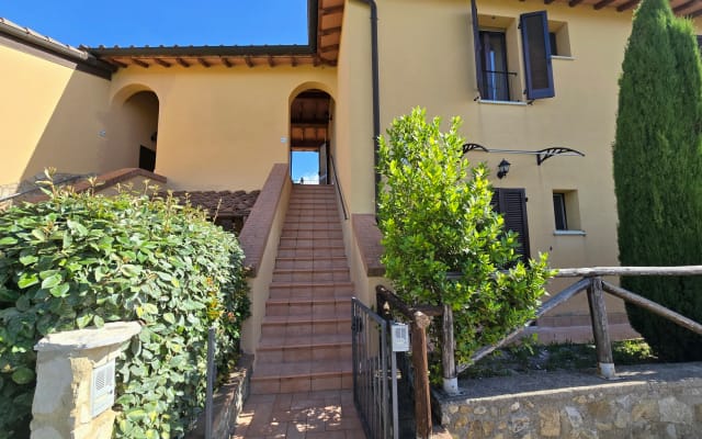 Charming apartment with panoramic balcony overlooking the Val D'Orcia.