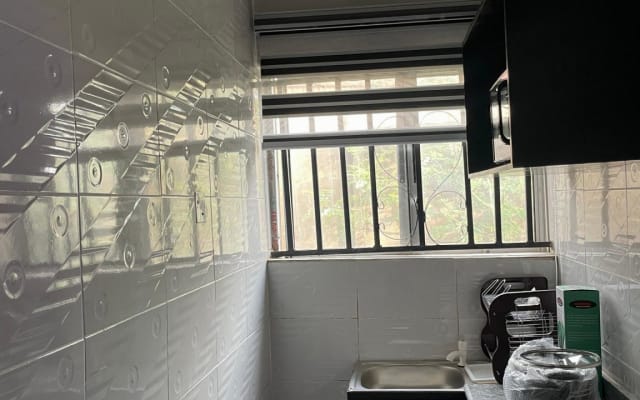 Ultimate Studio Apt, en el corazón de Abeokuta Baño y cocina...