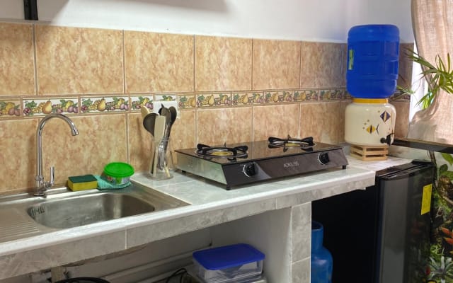 Suite acolhedora no centro de Baños de Agua Santa.