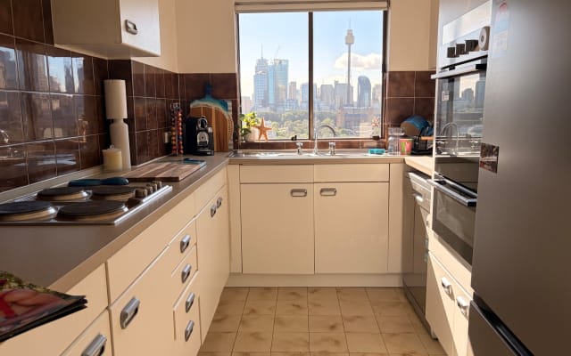 Lachlan's listing on misterb&b - Electric stove, pots and pans - blue Le Creuset, silverware and Nutribullet. 
Nespresso Coffee maker, dishwasher. 
Fridge space in new LG with freezer. 
New LG washing machine. Etc. 