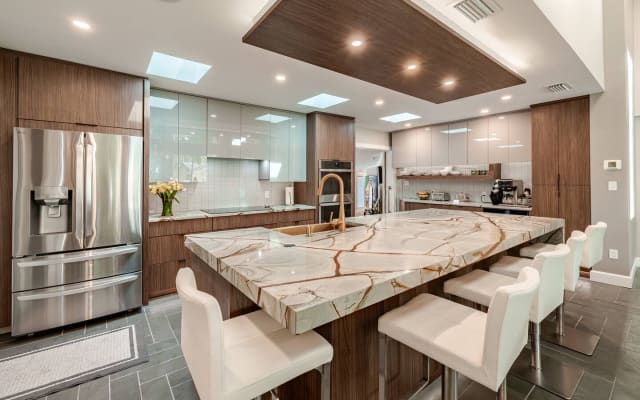 Ken's listing on misterb&b - Ultra modern kitchen fully stocked with utensils and pots and pans for your use.