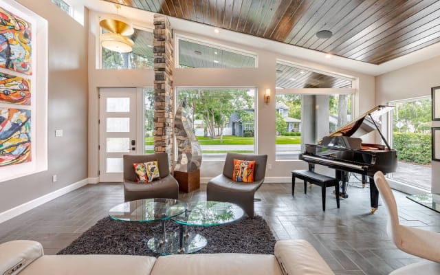 Ken's listing on misterb&b - Living room remodeled and expanded in June 2025. Architect designed and designer furnished. Complete with original art collection. Immerse yourself in luxury. Natural light pours in through the windows and skylights. Enjoy..