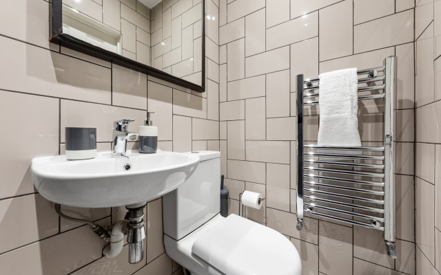 A pé para o estádio: Prime 1BR Stay | 2 Beds Sleeps 3