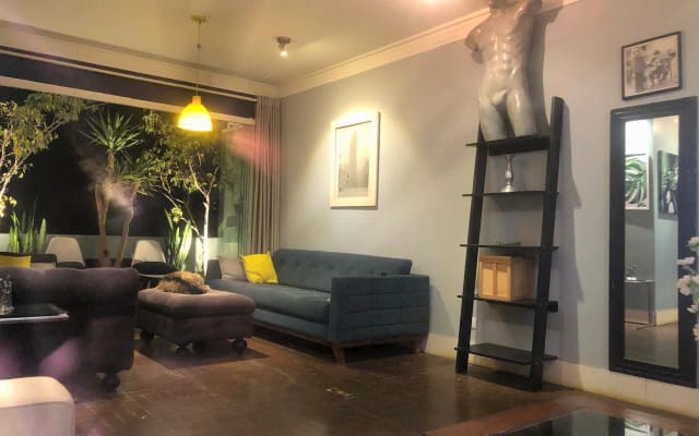 Sergio's listing on misterb&b - Living room and balcony integration.