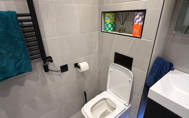 Fantastic bedroom and bathroom in converted school