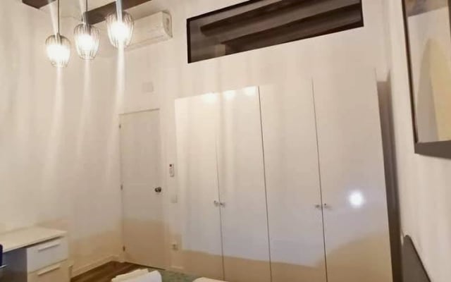 ROOM...WITH A DOUBLE BED, REFRIGERATOR, and MICROWAVE, air...