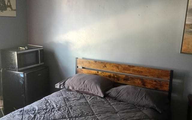 Cozy, clean, quiet room, in a house on a nice block.