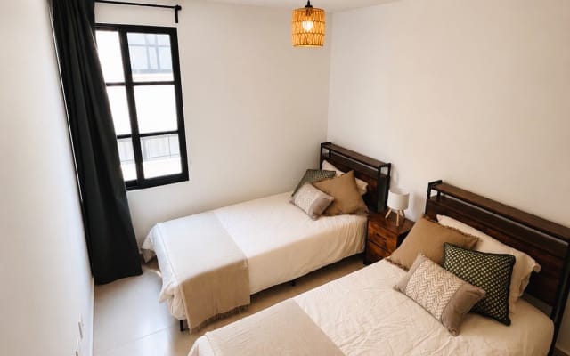 Annonce de Carlos sur misterb&b - Chambre secondaire avec deux lits simples et une armoire