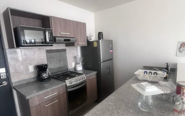 Bel appartement avec toutes les commodités et un service de sécurité...