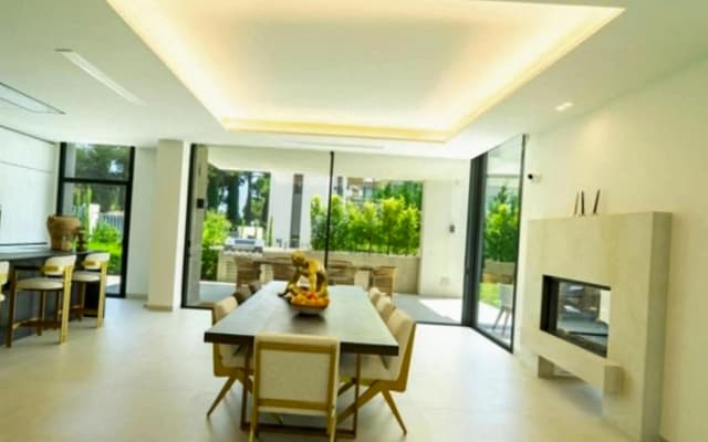 A brand-new, luxurious dream villa offering stunning ocean views, top...