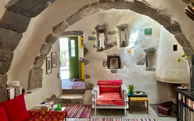 A stunning house and gardens between the sea and the volcano on...