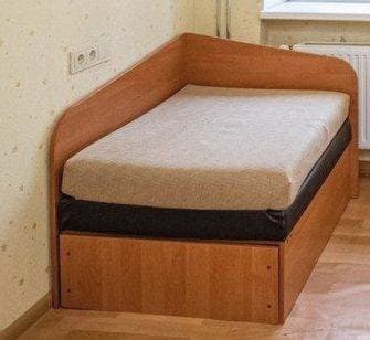 Simple bed in Vilnius, in Benas's room.