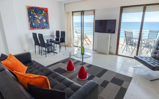 Modern beachfront penthouse with an elevator and ocean views