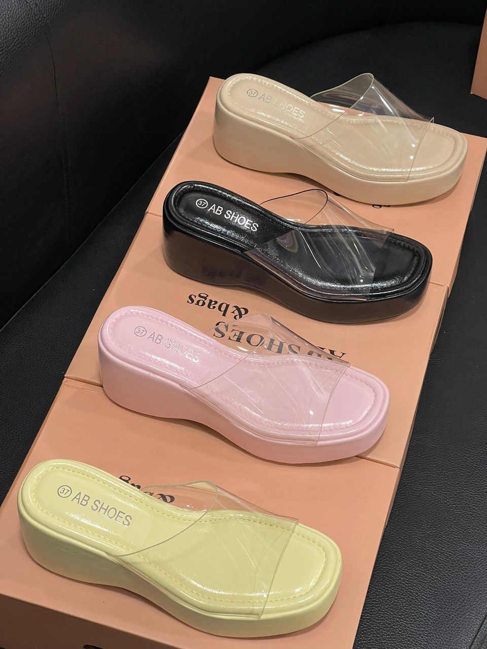 Mules compensées transparentes