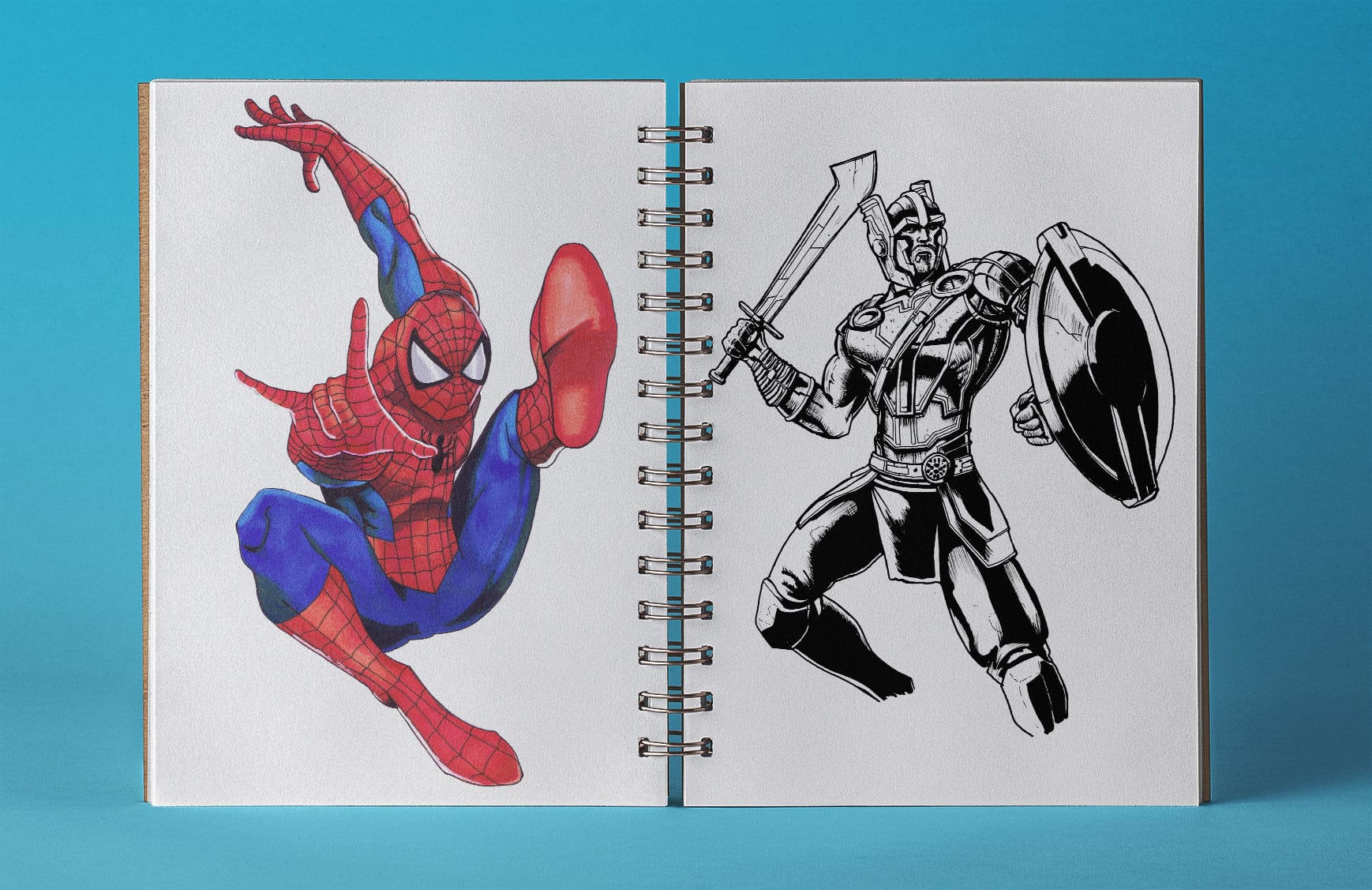 an open sketchbook with a coloured drawing of spiderman on the left page and a lineart ink drawing of Thor on the right page
