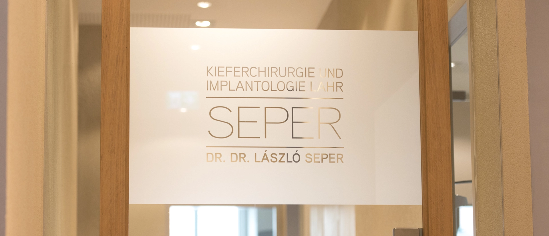 Praxis logo on glass