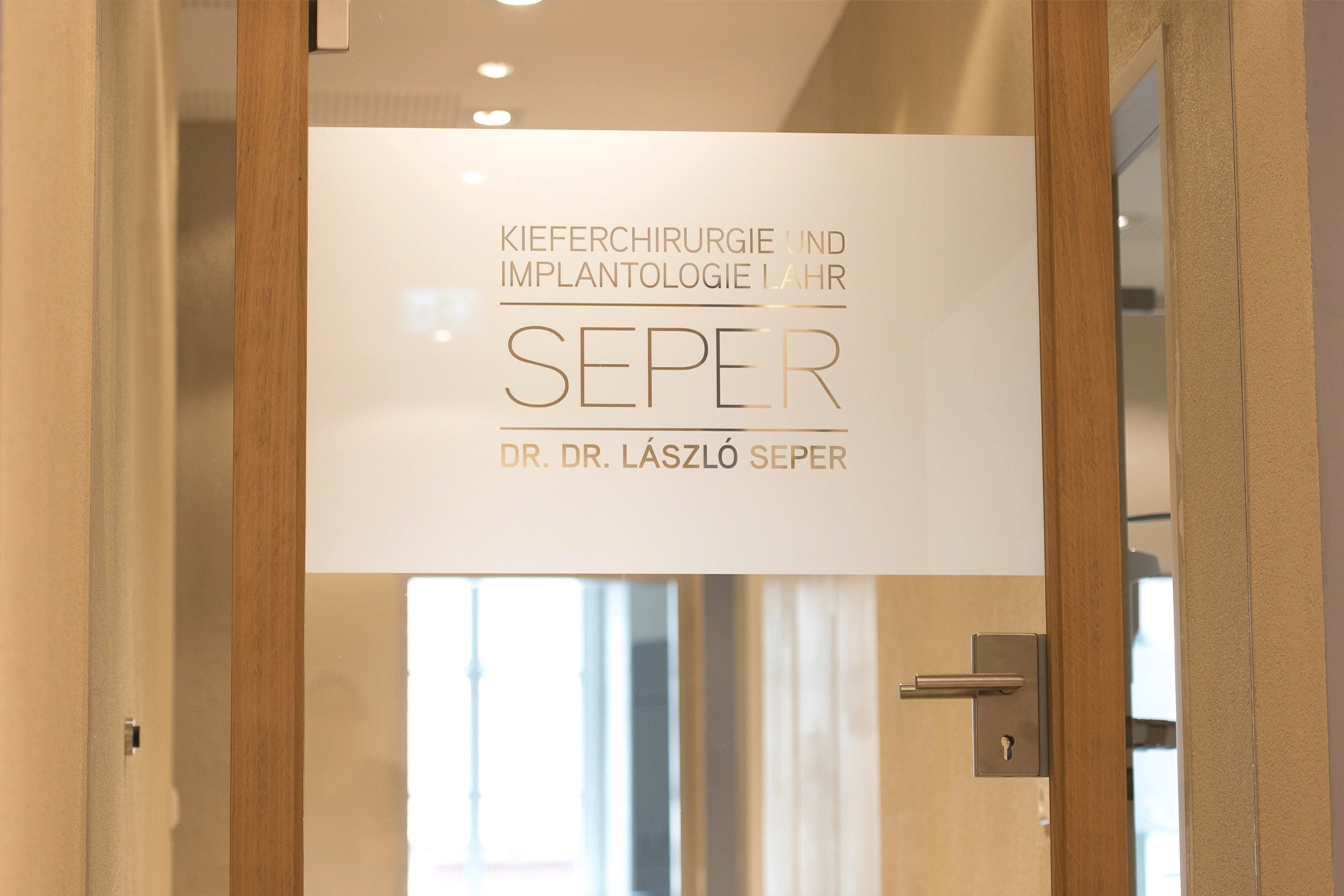 Glass door with Seper Praxis logo