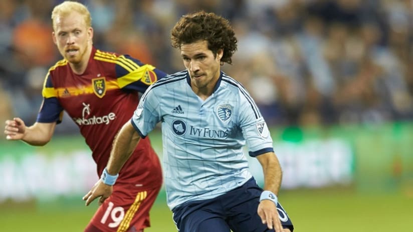 Sporting KC's Benny Feilhaber dribbles against Real Salt Lake's Luke Mulholland